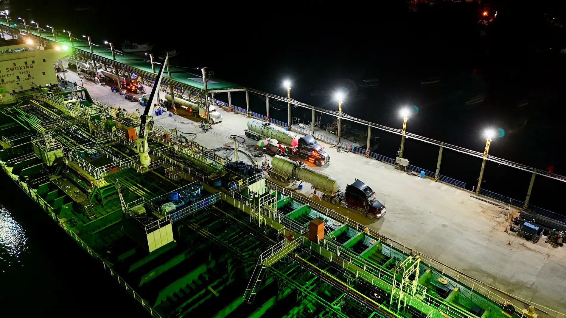 Palm oil CPO loading operations night Golfito Costa Rica